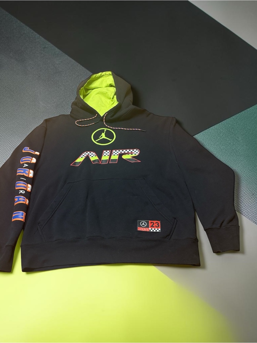 Jordan Men's Black Large Hoodie with Neon Lime Lining and Multicolor AIR Graphic